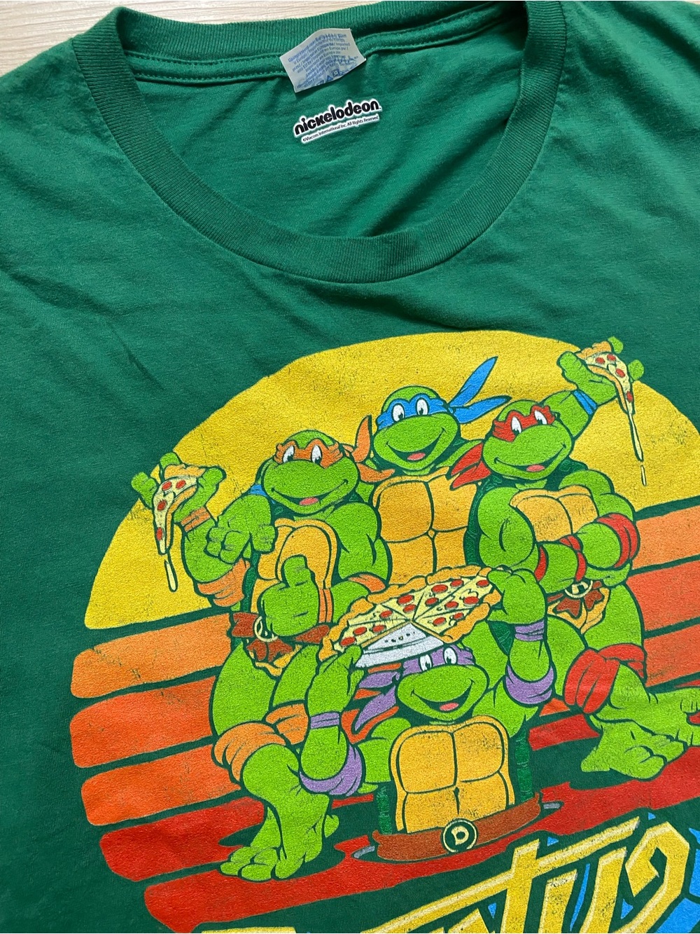Nickelodeon TMNT Green Tee with Yellow, Red, Orange, Blue Accents